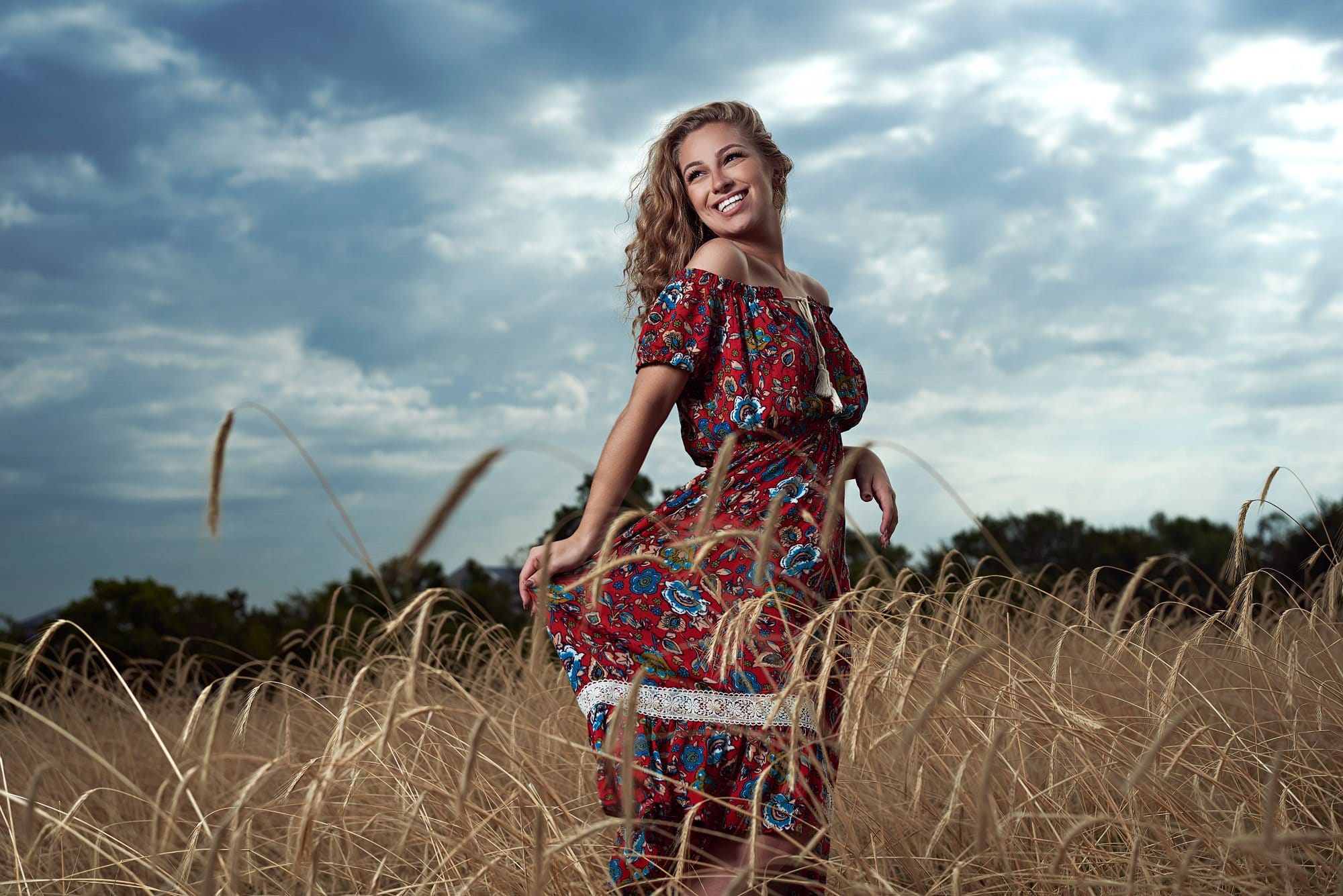 Dallas senior portraits for girls in a field in Mckinney texas