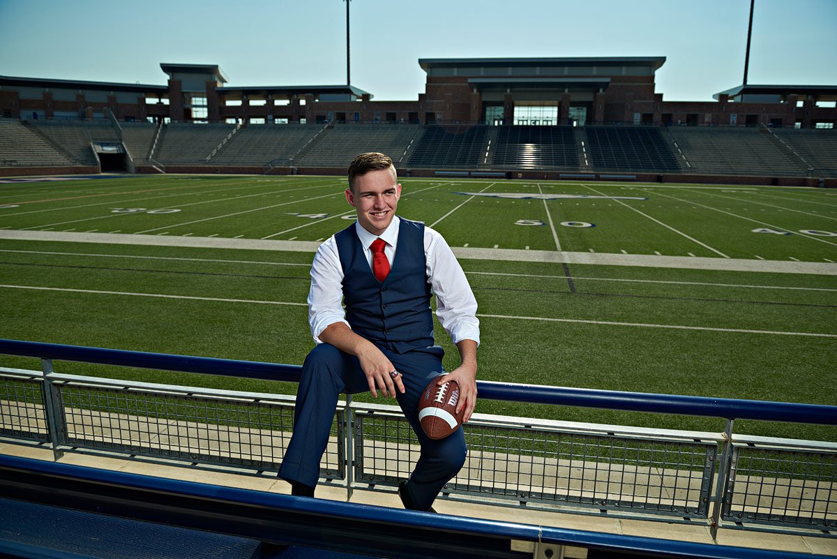 Allen senior photographer jeff dietz photographs football player at eagles stadium
