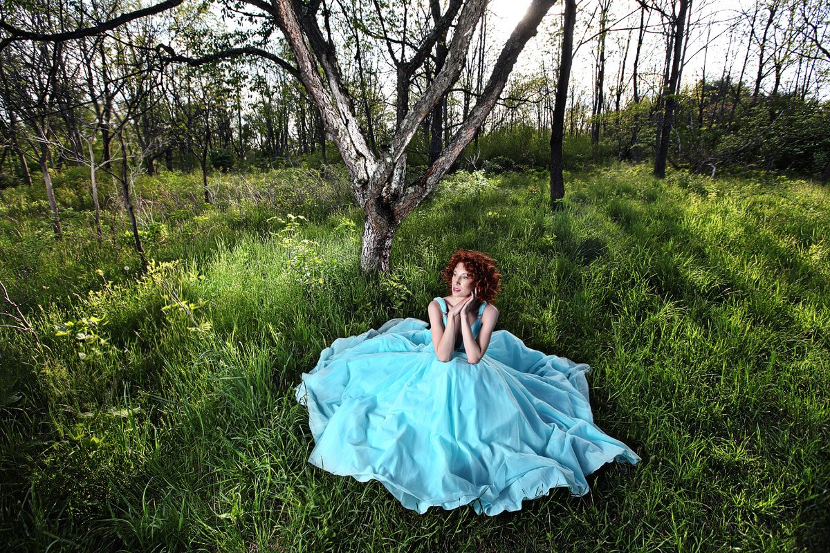 dallas senior girl wears teal prom gown in the woods for photos