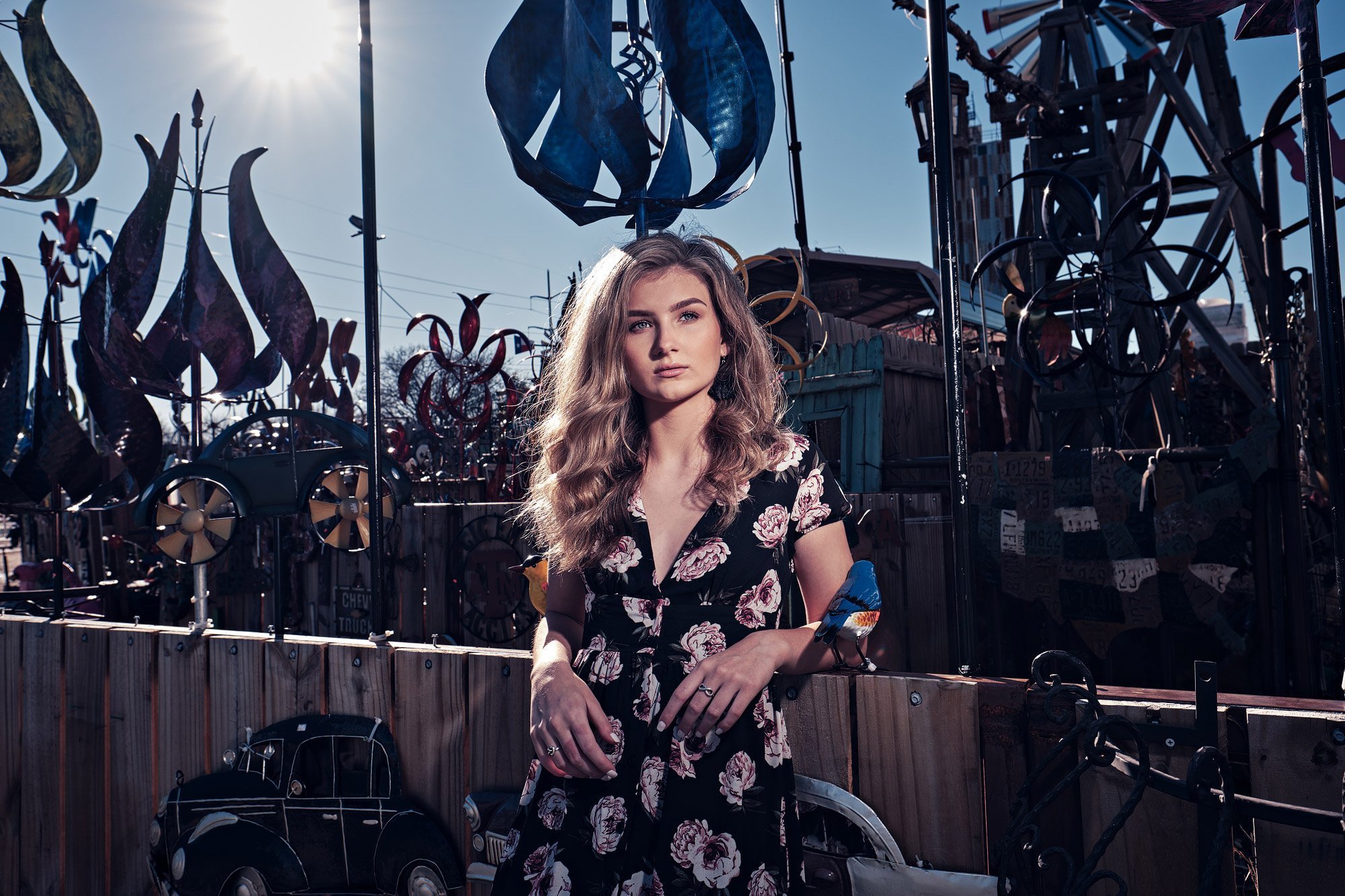 denton guyer senior portraits of ashley in a summer dress at sign shop in grapevine texas