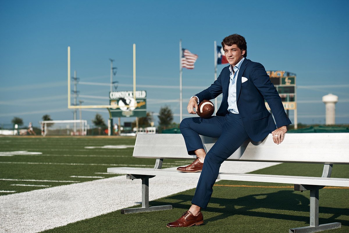 Legacy Christian Senior Portraits of Eagles Football player in blue suit