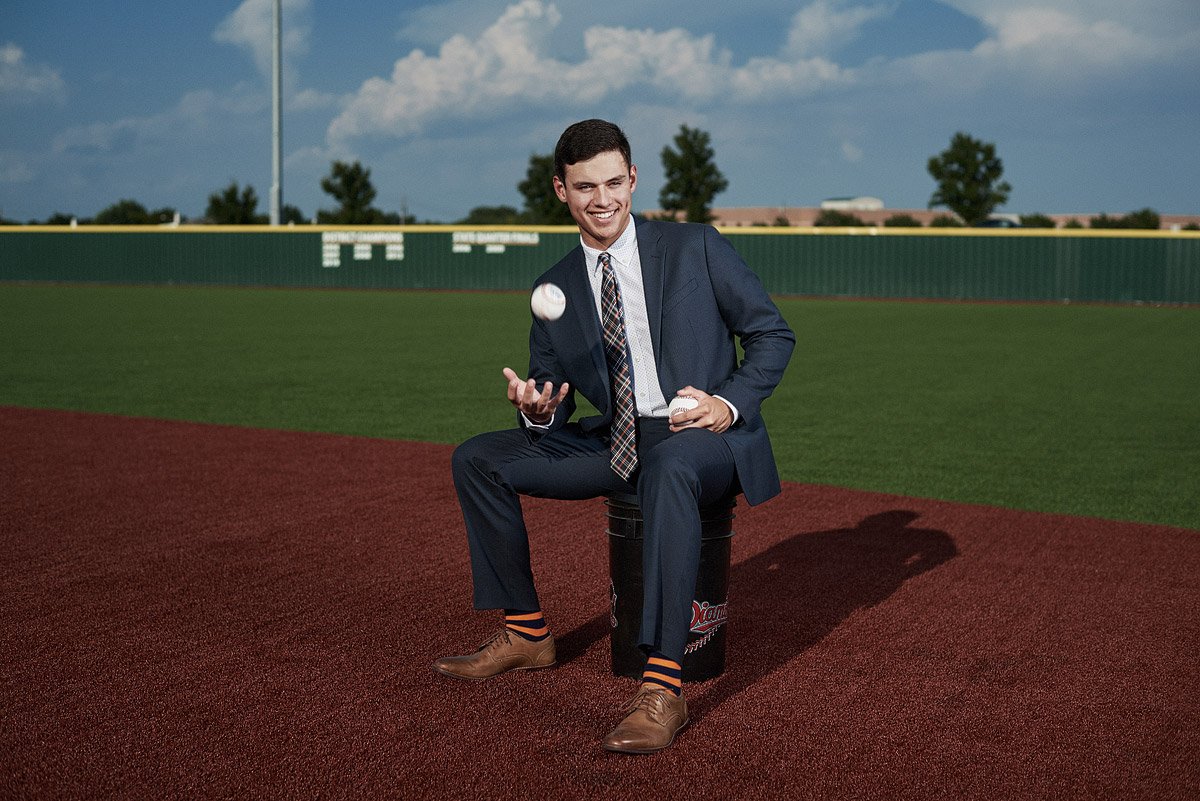 McKinney north senior baseball bulldogs in a suit for senior pictures