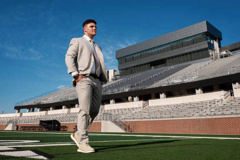 prosper football senior photos in the children's health stadium