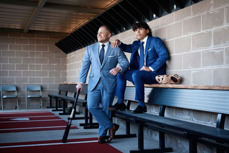 dallas senior sports portraits for boys son and dad from panther creek high school in frisco in dug out, photos with dad
