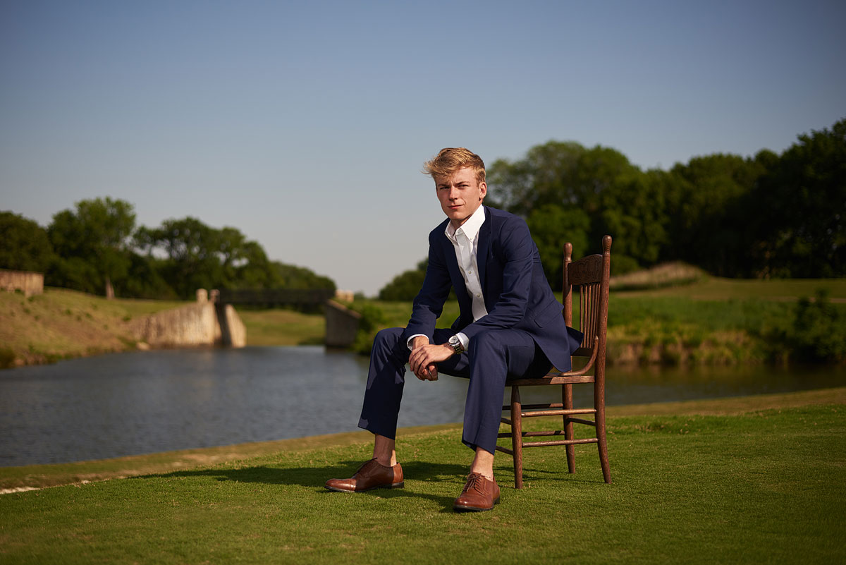 southlake carroll senior portraits for guys on golf resort course in suit photographer
