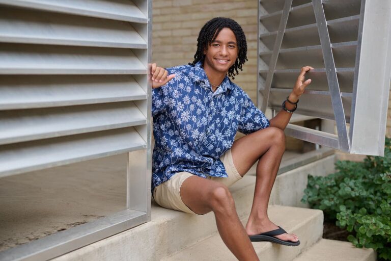 casual mens senior portraits on campus of greenhill school addison texas
